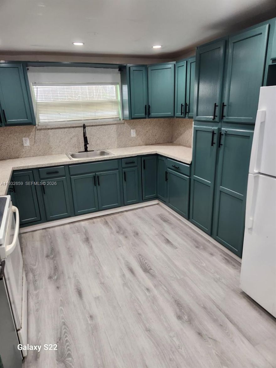 Property offers strong potential and is conveniently located near major highways, shopping, and schools. Ideal for owner-occupants or investors. Featuring a new roof installed with permits.  Situated on a generous size lot with a fully fenced yard, offering privacy and outdoor space.   Buyer to verify all information, including permits and square footage.