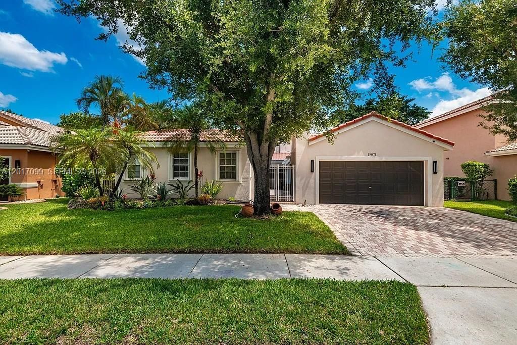 Photo of 19871 SW 3rd Pl, Pembroke Pines, FL 33029 (MLS # A12017099)