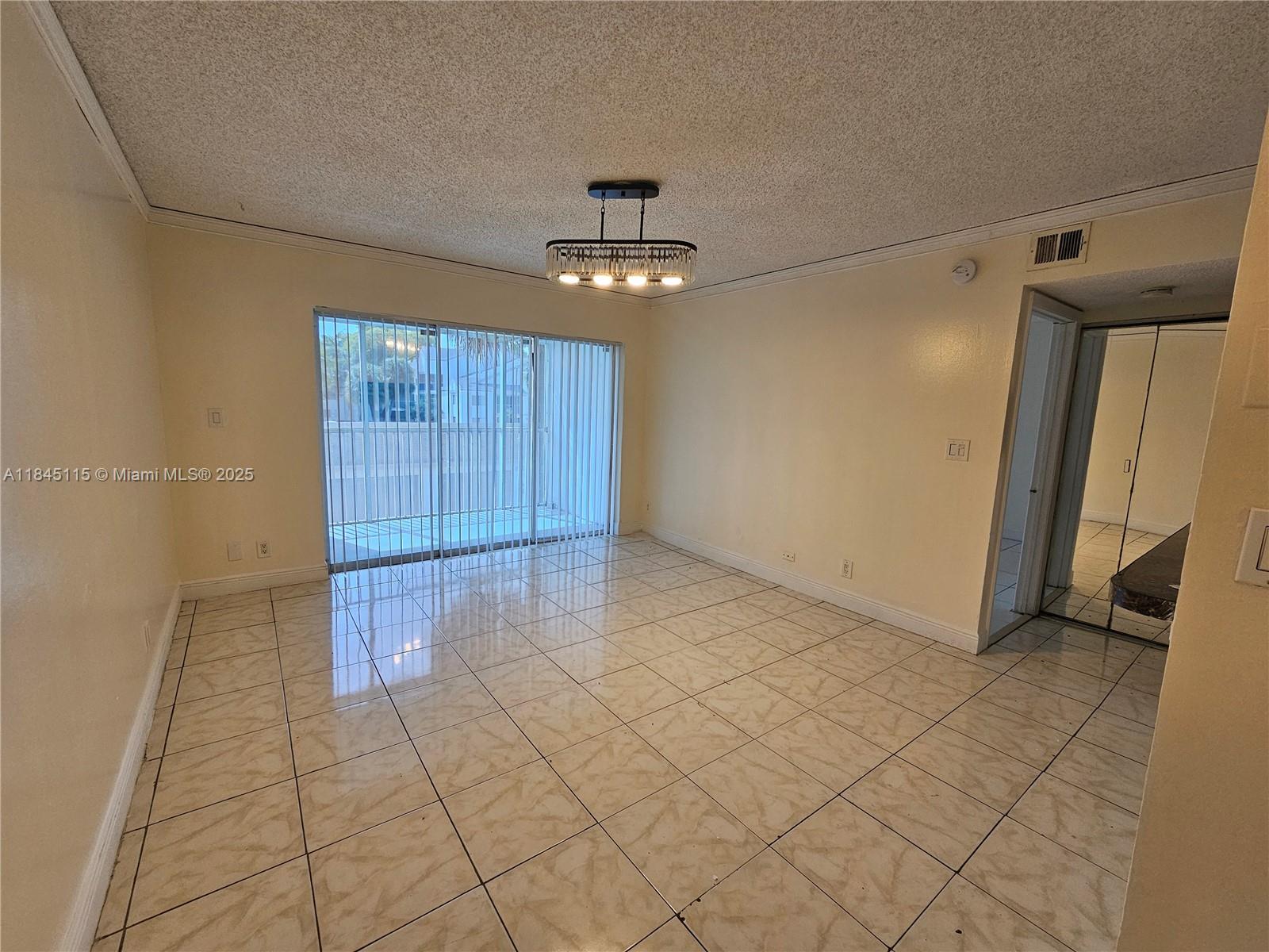 This well-maintained condo is perfect for both living or renting out. Featuring tile floors throughout, an in-unit washer and dryer, and a private patio, this home offers comfort and convenience. Located in a gated community with fantastic amenities including basketball and tennis courts, a clubhouse, gym, swimming pool, and spa. The prime location provides easy access to the Turnpike, major roads, supermarkets, restaurants, and schools. Whether you're an investor or looking for a comfortable home, this condo offers great potential. Don't miss out on this amazing opportunity!----------UNIT RENTED TILL 4/30/2026, PAYS $1,650.00 PER MONTH - 24hs previous notice for tenant to open the door to show