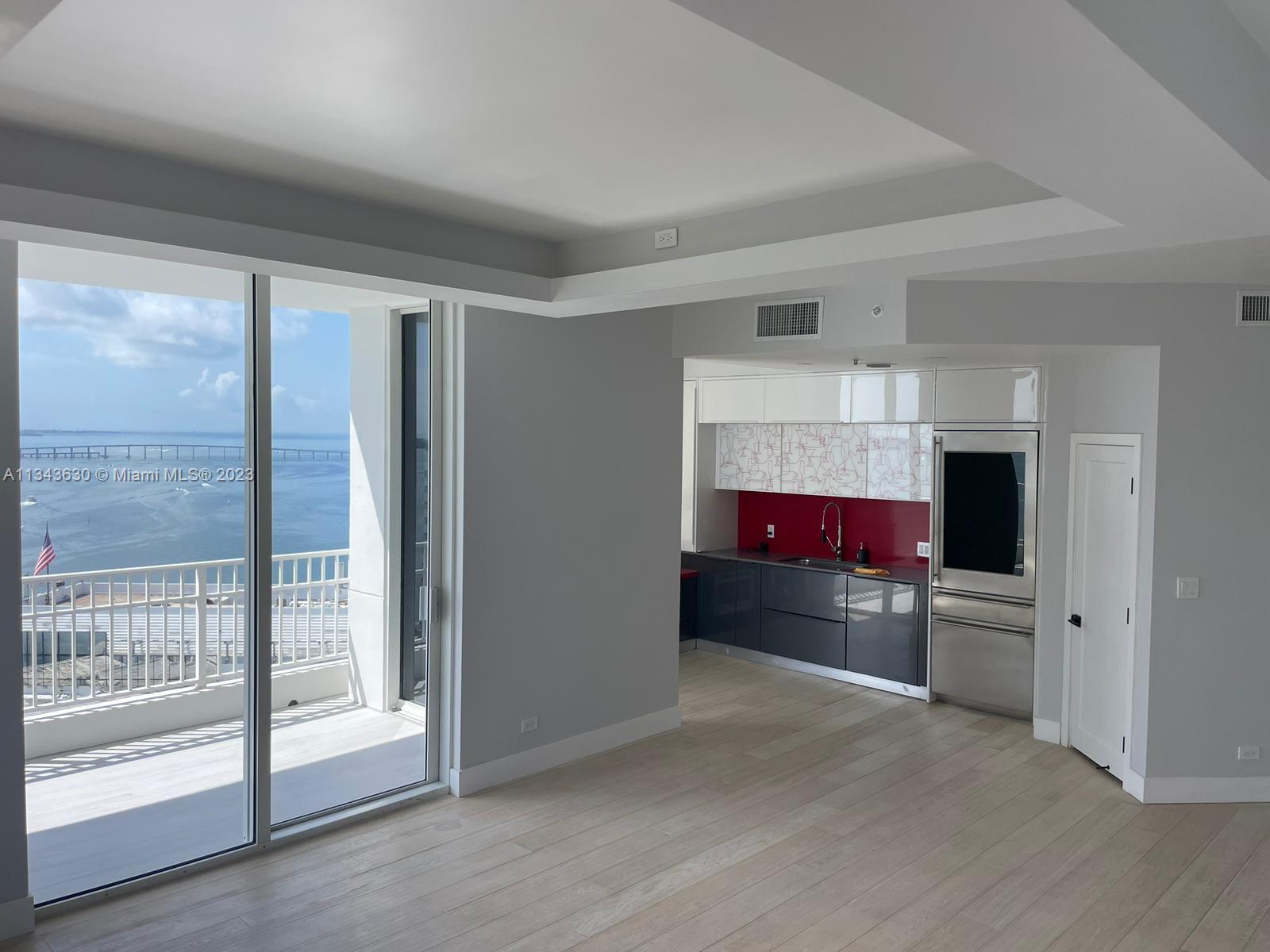 Improved price! ONE OF A KIND EXQUISITE LOWER PENTHOUSE - Amazing bay and city views from every angle, tons of light from this beautifully renovated unit. No expense spared. Extra high ceilings which gives the sensation of a larger apartment.
2 bedroom/2 bath with new cabinetry and customized walk-in closets. New bathrooms. electric blinds, wooden floors, decorators lighting, balcony floors, One of a few units with TWO ASSIGNED PARKING SPOTS (tandem next to elevators).
Located in Brickell Key with bay looking pool, 2-level gym, sauna, BBQ, kids room bike room, conference room, squash, basketball, computer room, 24/7 security and concierge. Pet friendly building.
Walking distance to shopping, dining, and to brickell city center.
Very easy to show.