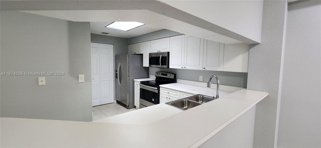 Photo of 2728 Anzio Ct #306, Palm Beach Gardens, FL 33410 (MLS # A11674056)