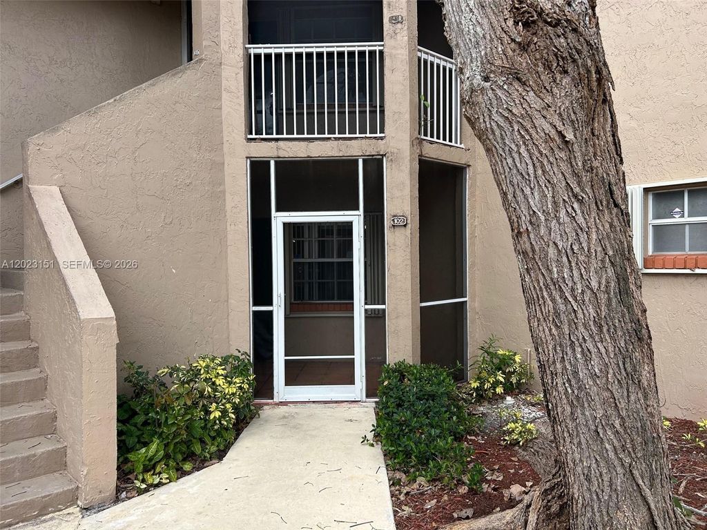 Photo of 301 SW 86th Ave #102, Pembroke Pines, FL 33025 (MLS # A12023151)