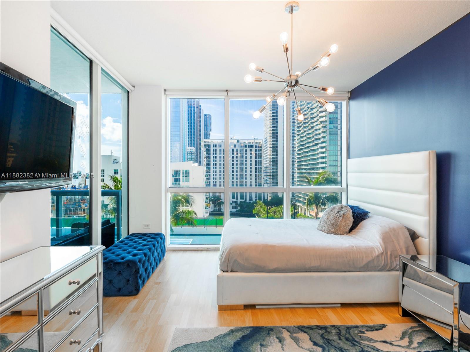 Best-priced 2-bed in Edgewater’s Platinum building offering a spacious layout with floor-to-ceiling impact windows with panoramic bay & city views. The open kitchen features granite countertops, stainless steel appliances, and an oversized in-unit washer/dryer. A large balcony connects both bedrooms and the living area. 1 designated covered parking and a private storage unit, included. West Elm Furniture available, offering a seamless turnkey move-in or investment opportunity (owner had it rented previously. High demand building). Resort-style amenities - a remodeled pool with lounge deck, fitness center, sauna, steam room, Jacuzzi, BBQ area, 24-hour concierge, security + more. Just steps from the Design District, Midtown, and Wynwood, Miami Beach, Brickell, and the airport.