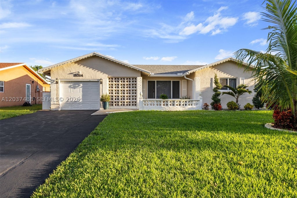 Photo of 8014 NW 101st Ave, Tamarac, FL 33321 (MLS # A12037488)