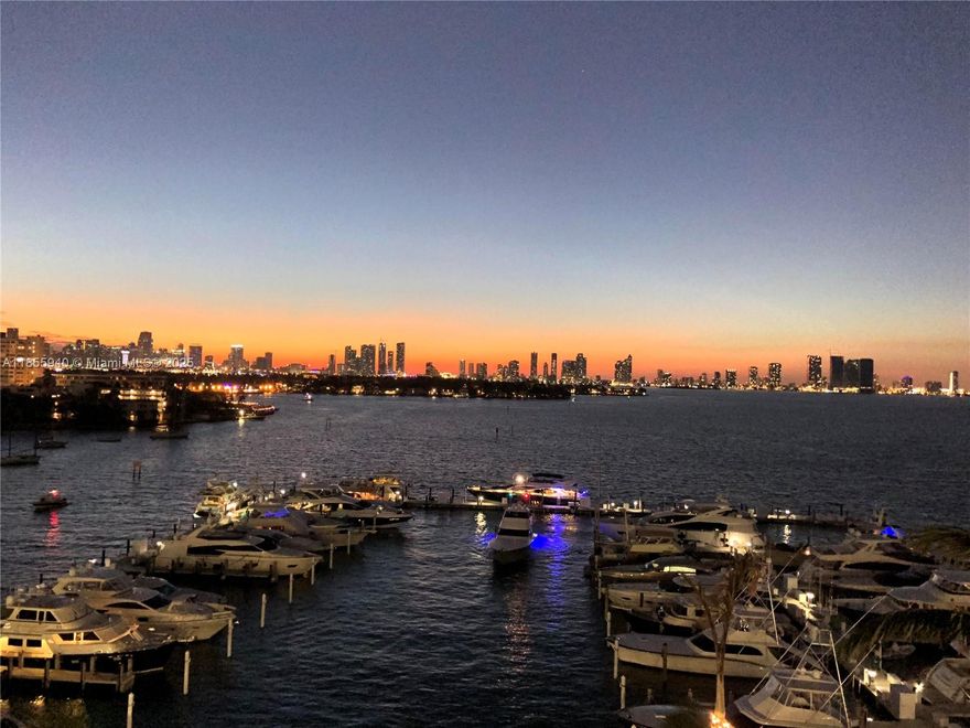 Imagine your new Miami lifestyle anchored above Sunset Harbour Yacht Club, in a direct-bay NW corner home. Panoramic views of Biscayne Bay, the marina and downtown's skyline across the water.  3 bedrooms, 3 bathrooms, 3 balconies, 2 garage spaces. This is the best price per square foot facing west in the neighborhood.  It is freshly painted and appointed for fast move in, investment or a blank slate for your designer. The famous 12 line at Sunset Harbour has one of the widest living rooms, perfect for family dinners, holiday entertaining and a comfortable space to work from home. Established and secure condo association with reserves, solid structure and mid-way through a $12 million building facelift (paid in full by seller). Vibrant neighborhood of parks, cafes, upscale grocers + gyms