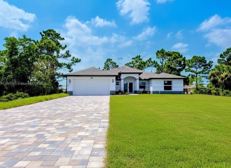 Welcome to 798 Bell Blvd S, a 3,000 SQGF sanctuary in Lehigh Acres where space, style, and serenity converge. Seller offers $15,000 toward buyer’s closing costs with a full-price offer. This 4-bed, 3-bath home features impact windows/doors, LED lighting, and modern tile flooring. The chef’s kitchen showcases a quartz island, soft-close wood cabinetry, and stainless-steel appliances, ideal for hosting and everyday elegance. The master suite is a private retreat with dual walk-in closets, dual sinks, and a spa-inspired shower. Located in a no-HOA, non-gated neighborhood near SR-82, I-75, Fort Myers, and RSW Airport, this home is surrounded by beaches, golf courses, nature preserves, and parks, perfect for weekend escapes and cherished family moments. Bring your best offers!