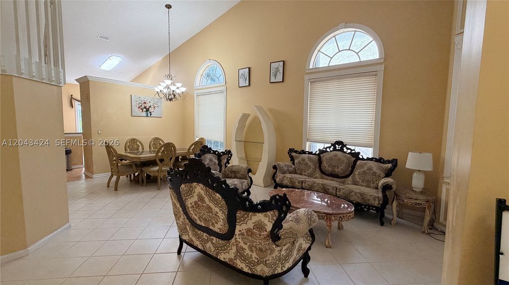 Photo of 5569 NW 106th Dr, Coral Springs, FL 33076 (MLS # A12043424)