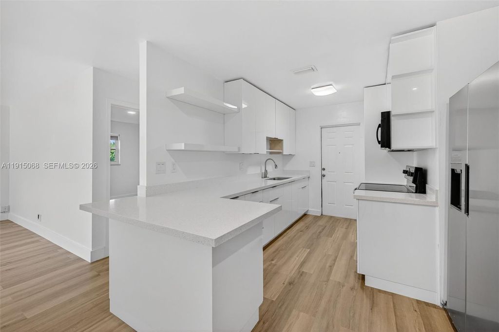 Photo of 11301 NW 39th St #W, Coral Springs, FL 33065 (MLS # A11915068)