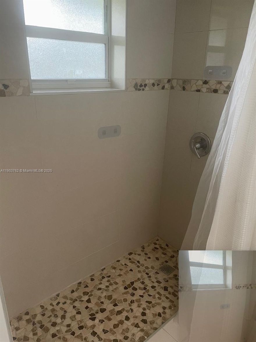 CALUSA CLUB 3/2 SITUATED ON AN OVERSIZE LOT, AND CONVENIENT STORAGE SHEDS UPDATED ROOF AND
AC