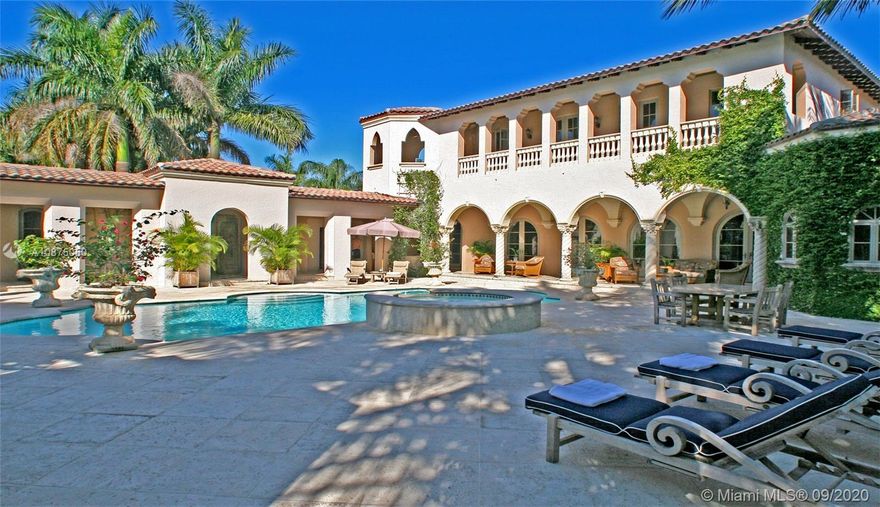 When you enter this very private compound the complete vision is beautiful enough to take your breath away. Magnificently unique! Finishes are handcrafted and one of a kind. The main house connects to a three-bedroom guest house with its own living room and cozy den. Another guest suite overlooks the large pool with its stylish outdoor cabana. Oversized gourmet kitchen, volume ceilings, elegant living room. Entire 2nd floor dedicated to master suite. Huge 22,693 SF double lot with walkable gardens on a quiet cul-de-sac. Patios, porches, terraces & lovely loggias connect this extravagant resort-style home. Two-car garage + storage. Large flexible space for gym, theater, play room etc. This is one of the best and the rarest. Close to Kids Park, Dog Park & Community Center or bike to Ocean.