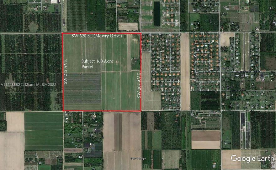 147 Acres of Agriculture land with possibility to build homes on every 5 Acre parcel. Currently an income producing fruit tree farm.