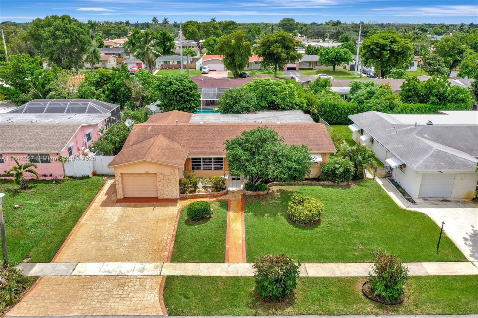 Opportunity Knocks - Situated in one of the area's most sought-after communities, this home offers incredible potential for buyers ready to update or renovate to their own style. The home’s layout provides a great canvas for creating a future masterpiece. With a solid roof (2016), well maintained A/C system (2017), and a newer gas water heater (2022), the essentials are already in place. A spacious screened-in patio is perfect for relaxing or entertaining, while the generous yard offers plenty of room for future enhancements. This is an excellent opportunity for investors or homeowners ready to add value and make this home their own.
