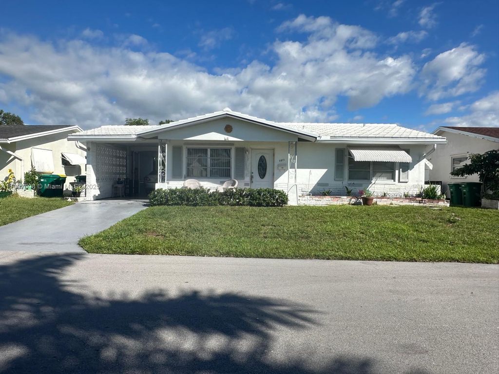Photo of 4615 NW 47th St, Tamarac, FL 33319 (MLS # A11897698)