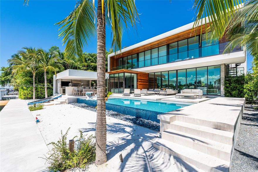 This breathtaking, modern 8,130 sf  waterfront, single-family home boasts impeccable design and luxurious living, offering 6 spacious bedrooms and 8 elegant bathrooms. Located at 108 W Rivo Alto Dr in the prestigious Miami Beach neighborhood, this property epitomizes sophistication and comfort.

No detail has been overlooked in the creation of this home, which features a boat lift (fits up to 30ft boat) with 90ft of water frontage, high-end finishes and top-of-the-line furnishings throughout.  Indulge in resort-style living with amenities such as a sauna, cold plunge, steam room, and an expansive rooftop deck that provides stunning views.

Perfect for both relaxation and entertaining, this fully furnished home combines cutting-edge design with unparalleled luxury.