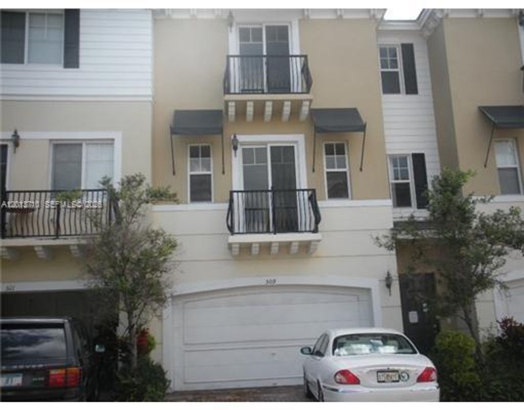Photo of 509 NW 39th Cir, Boca Raton, FL 33431 (MLS # A12013710)