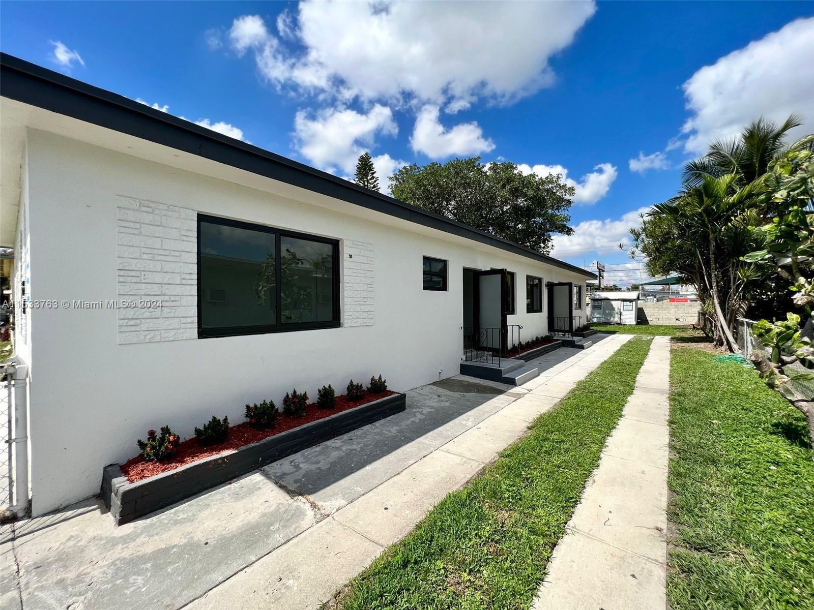 Duplex 10 minutes of Wynwood & 12 minutes to Downtown Miami, close to Miami International Airport, Brickell, Midtown, Art/Design Districts & Baseball Stadium. Each unit includes 2 bedrooms & 1 full bathroom, brand new roof 2021, freshly painted, modern open style kitchen, spacious living area, featuring impact windows and doors, with available parking.  Both units come equipped with stainless steel appliances, central a/c, washer/dryer shared. Conveniently located near major expressways, minutes away from Miami Beach, Downtown, hospitals, schools, shopping & dining. Perfect for a occupying owner while enjoying the income from the other unit or fantastic safe income generating long or short term investment  for any type of investor.