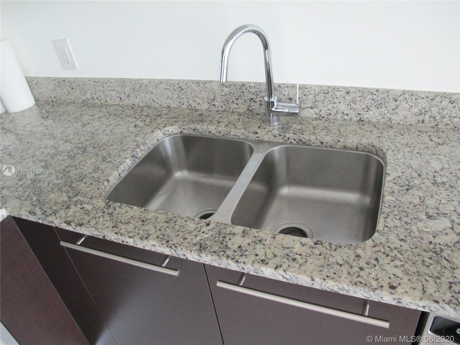 THE PLAZA 901 BRICKELL CO - Residential Lease