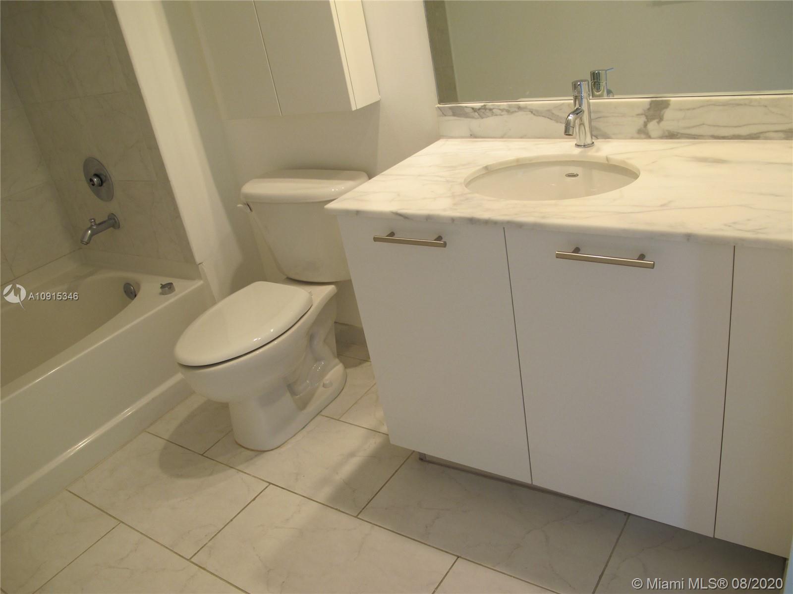 THE PLAZA 901 BRICKELL CO - Residential Lease