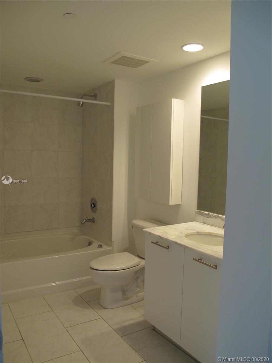 THE PLAZA 901 BRICKELL CO - Residential Lease