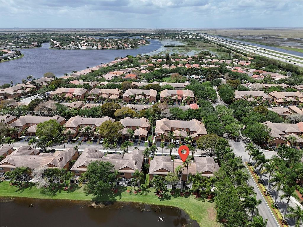 Photo of 1492 Veracruz Ln #4-4, Weston, FL 33327 (MLS # A11999519)