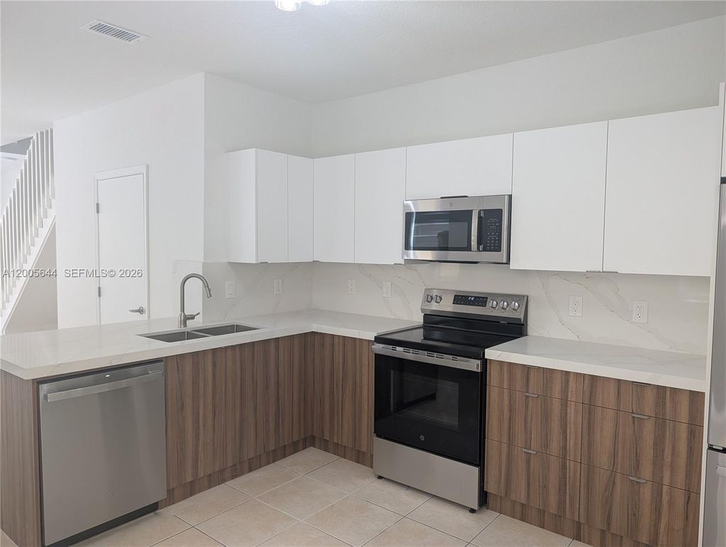 Photo of 2143 Hacienda Ter, Weston, FL 33327 (MLS # A12005644)