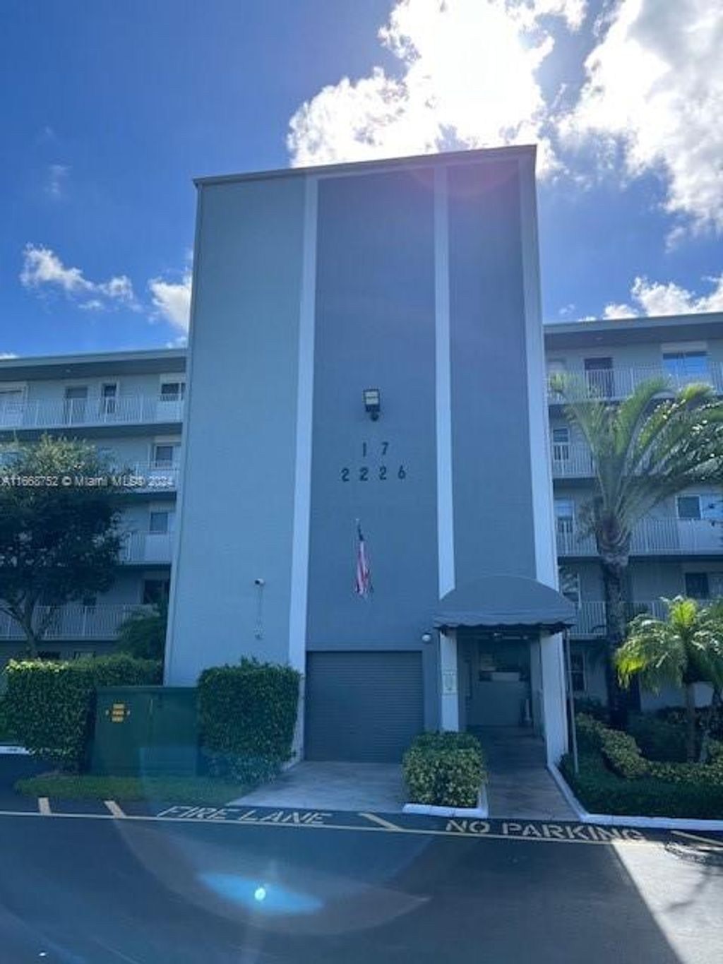 Photo of 2226 N Cypress Bend Dr #210, Pompano Beach, FL 33069 (MLS # A11668752)