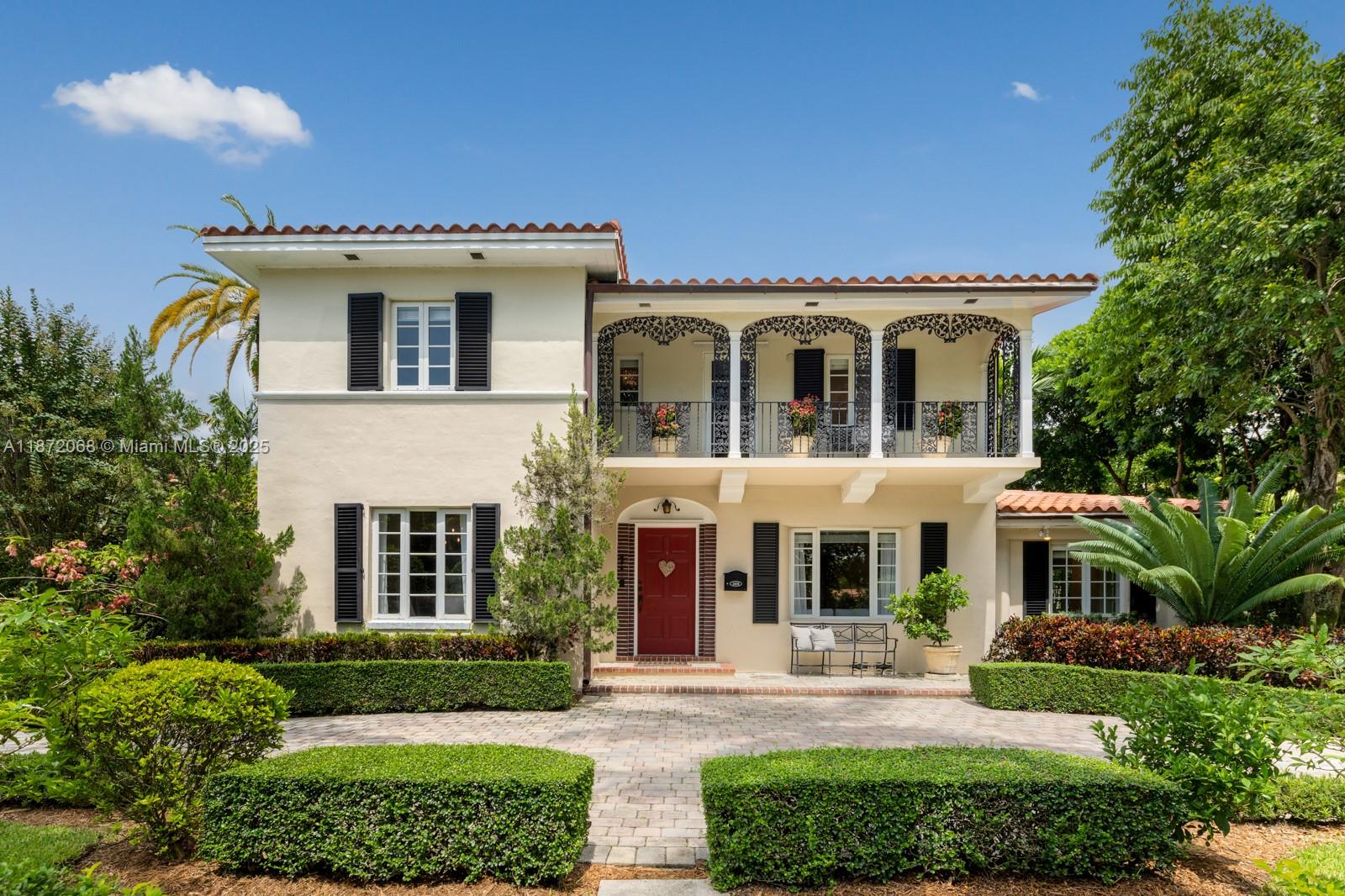Designed in 1939 by architect Jorge Fink, this two-story residence sits on a corner 18,667 sq. ft. lot in the prestigious Golden Triangle of Coral Gables. Offering nearly 4,000 sq. ft., the home features 3 bedrooms, 3.5 baths, a spacious master suite with walk-in closet, a separate dining room, and multiple flexible living areas including an office, lounge, and TV room. Distinctive New Orleans–style ironwork enhances its historic charm.
Recent updates include a new roof (2025), impact windows, updated electrical, and more. A detached garage with A/C, full bath, and mini kitchen is ideal as a guest suite or studio.