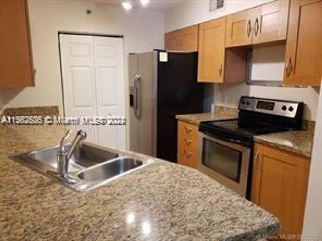 Photo of 3279 Clint Moore Rd #105, Boca Raton, FL 33496 (MLS # A11562626)