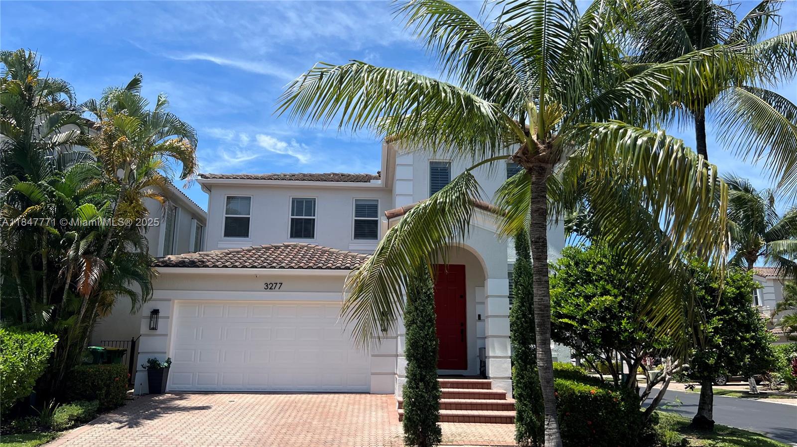 Stunning 4bd/3.5 bath w loft located on a quiet corner with beautiful views of the luscious landscaping and garden. Great backyard for entertaining, kids and pets. Option for pool!!Features include a brand new renovated modern kitchen, bathrooms and high impact windows throughout with the exception of the glass blocks that have shutters. Built in closets, Garage Tek organization system and newer water heater. AC's were replaced about 7 years ago. This model is well in demand as it offers a full suite on the 1st floor. High volume ceilings, lots of natural light and an option to add a 5th bedroom . Huge master bedroom with sitting room!! AVENTURA LAKES is a prestigious gated community with 24 security, 2 pools, gym and clubhouse.. Walk to restaurants, shops and "A" rated schools..