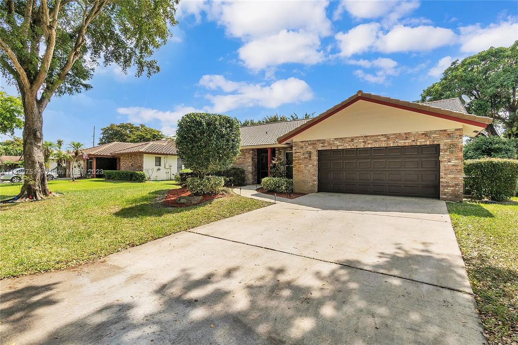 Photo of 3915 NW 69th Ter, Coral Springs, FL 33065 (MLS # A11386751)