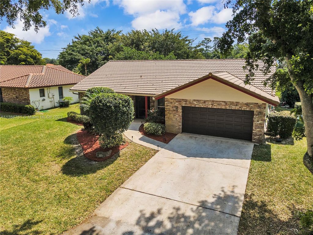 Photo of 3915 NW 69th Ter, Coral Springs, FL 33065 (MLS # A11386751)