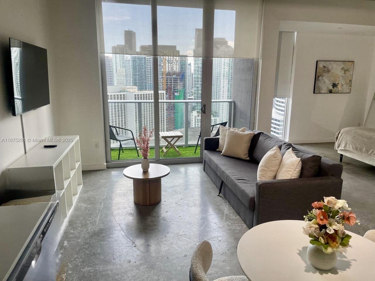 Welcome to your dream loft in Downtown Miami! It's a beautiful Fully Furnished one-bedroom, one-bath studio at "Centro", Stylish turn-key unit with 30-day rentals allowed 12 times/year. This modern high-floor condo features sleek finishes, floor-to-ceiling windows showcasing vibrant city views and partial water views and chic décor. Enjoy luxury amenities including a Rooftop Pool with 360° views of the bay and city skyline, Penthouse level 2 story lounge, Gym, Steam room / Sauna, Secured Dog walking area, Bike room, Amazon lockers, Valet, 24/7 Front Desk. Steps from Bayfront Park, Museum Park, Miami World Center, High-end Dinning/Shops, Perez and Frost Museums and Whole Foods. 5-10 Mins from Brickell, Wynwood, Edgewater, Sobe and Airport. VACANT and Ideal for personal use or investment.