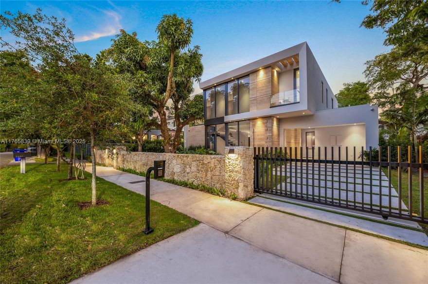 Sophisticated new construction home in North Coconut Grove. The house features, clean lines, earthy tones, lush landscaping and open floor plan connecting the indoor with the outdoor, 4 Bedrooms + studio and 5 full bathrooms, high ceilings, floor to ceiling windows, wood wall covers throughout the house, hi-end appliances and fixtures, marble floors and built in wood closets. The master suite is a luxurious retreat, complete with a spa-like en-suite bathroom, a spacious walk-in closet, and a private terrace. The living area and Kitchen connects with an outdoor terrace overlooking the pool, and built-in summer kitchen. Located in a quiet street in the heart of North Coconut Grove, it is just mins from top-rated A+ schools, CocoWalk, restaurants, parks and marinas.