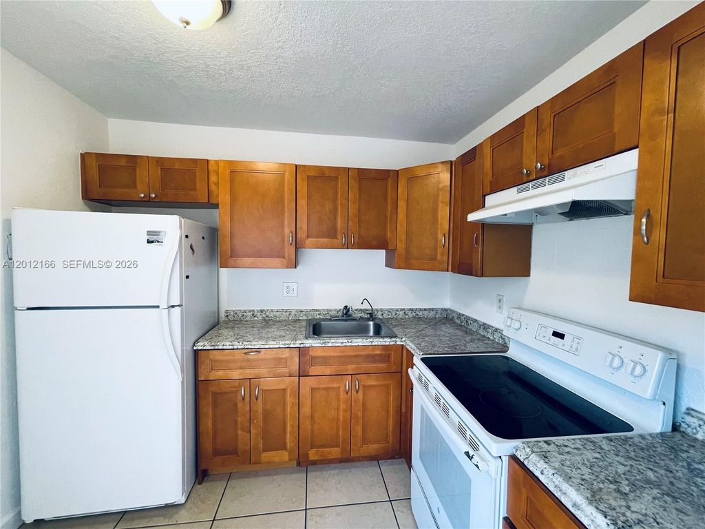 Photo of 825 NW 46th Ave #825, Plantation, FL 33317 (MLS # A12012166)