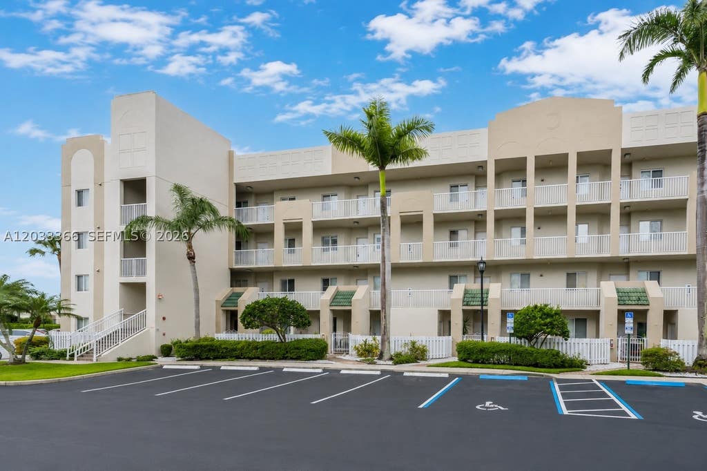 Photo of 7727 Southampton Ter #202, Tamarac, FL 33321 (MLS # A12033366)