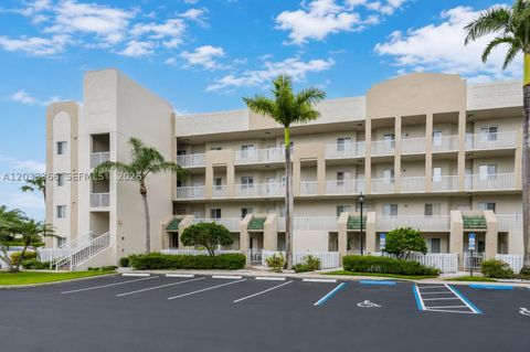 Photo of 7727 Southampton Ter #202, Tamarac, FL 33321 (MLS # A12033366)