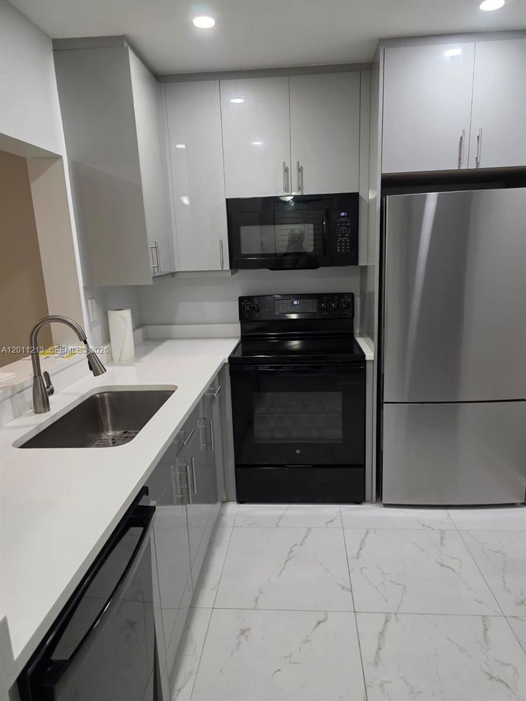 Photo of 4163 NW 90th Ave #202, Coral Springs, FL 33065 (MLS # A12011213)