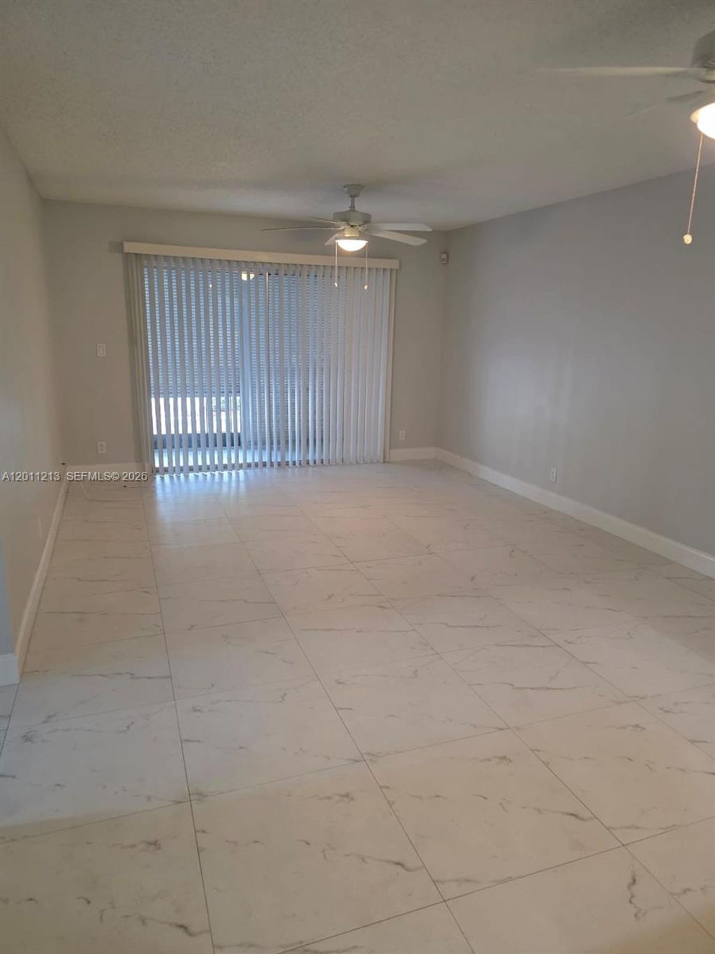 Photo of 4163 NW 90th Ave #202, Coral Springs, FL 33065 (MLS # A12011213)