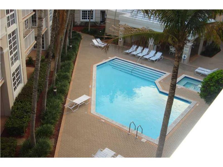 Univ Inn Condo 2/2 penthouse w/tall ceilings. Across from UM campus and Metro Station.  Large window overlooking pool area,neutral berber carpet throughout. Full size washer/dryer, basic cbl/water/sewer & 1/assigned uncovered parking included, w/decal you  can use visitor parking.