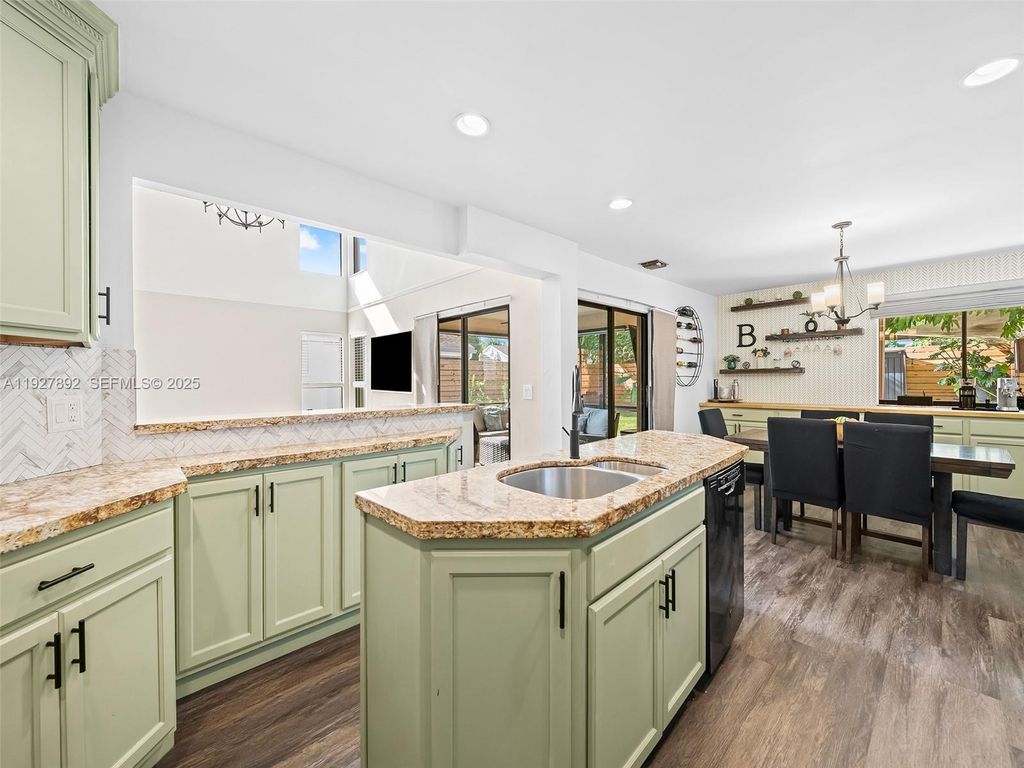 Photo of 1961 NW 35th Ave, Coconut Creek, FL 33066 (MLS # A11927892)