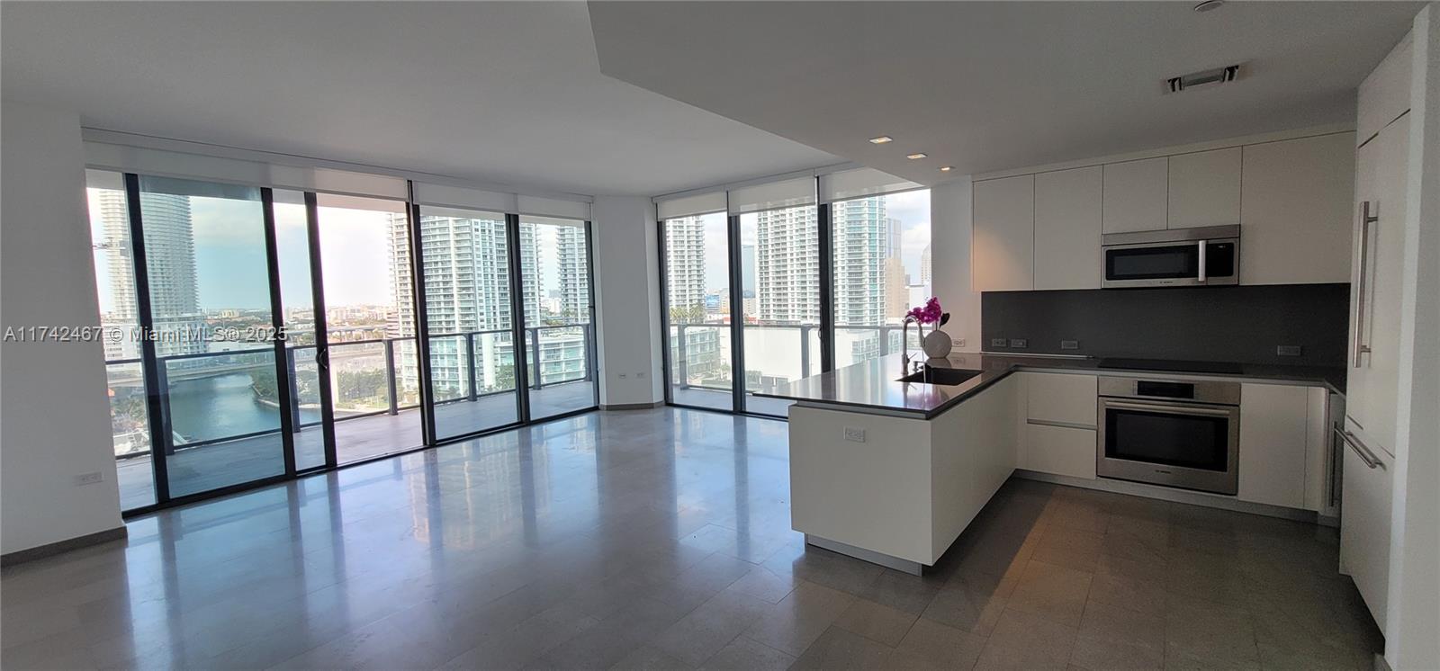 Best Price in the best line at The Reach Brickell City Centre ; Enjoy breathtaking views to the city and the Miami River. This spacious corner unit (1,265 sq f. plus terrace) features 2 bedrooms, 2.5 bathrooms,split bedrooms. Italian cabinetry and stainless appliances in the kitchen, quartz counttertop, marble floors and state of the art bathrooms. Great amenities include fitness center, onsite personal trainer, children's playground, resident café & library, BBQ grills, heated pools & spa. Walk to area restaurants in the heart of Brickell.