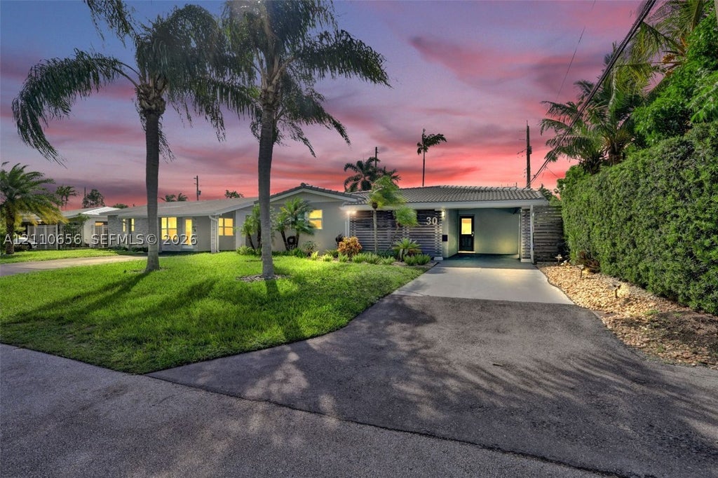 Photo of 30 NE 48th Ct, Oakland Park, FL 33334 (MLS # A12110656)
