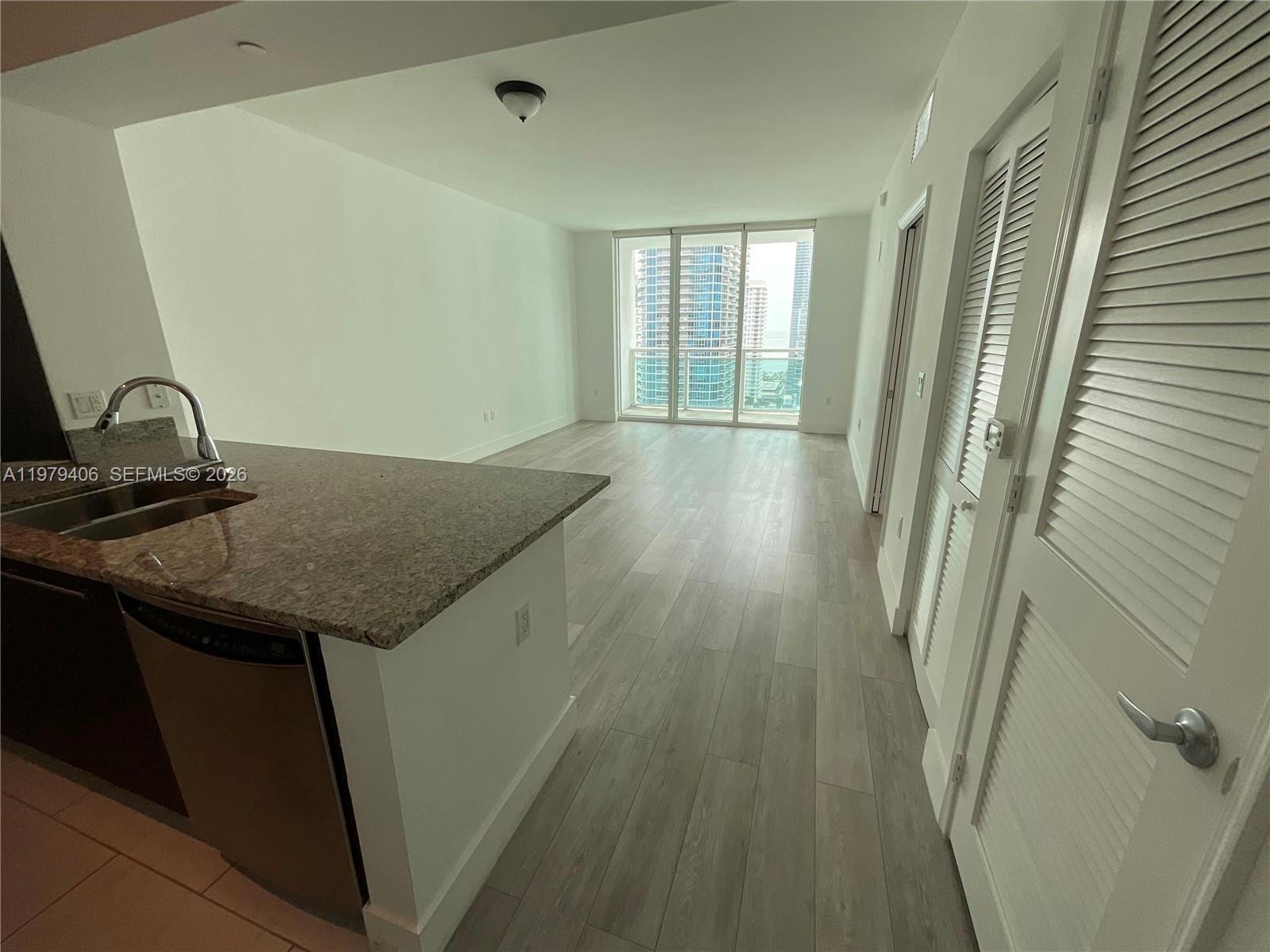 THE PLAZA 851 BRICKELL CO - Residential Lease
