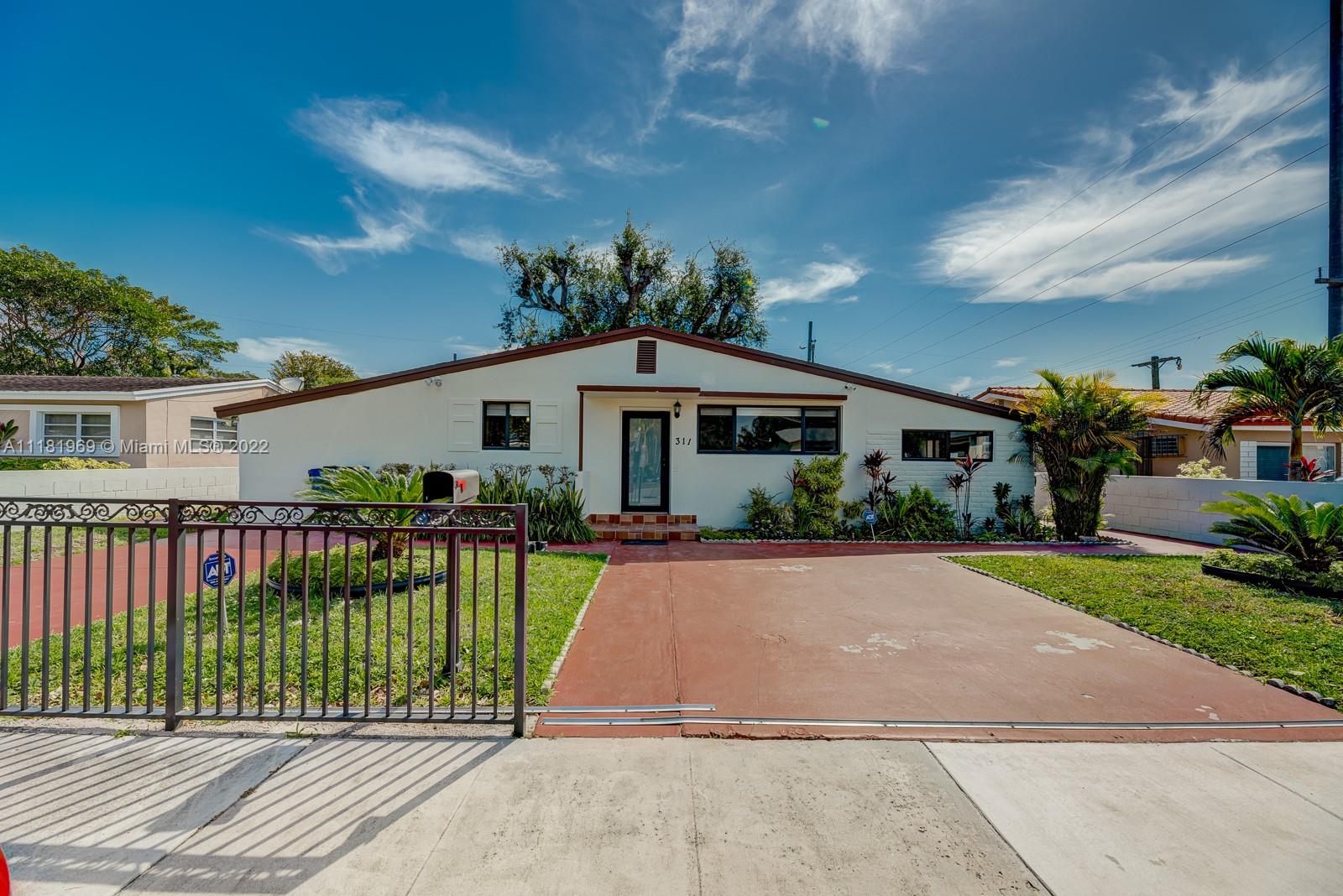Centrally located!! Remodeled 4 bedroom 1 bath gated home with renovated kitchen, tile floors, impact windows and door and Washer/Dryer . PLUS $500 for Utilities included ( Electricity, Water, Yard Maintenance , Internet ATT Fiber) Large yard with covered terrace. Concrete driveway with space for 2 cars. 3.5 miles from Miami International Airport and 12 miles from Miami Beach. Freshly painted and in excellent condition. Will not last.