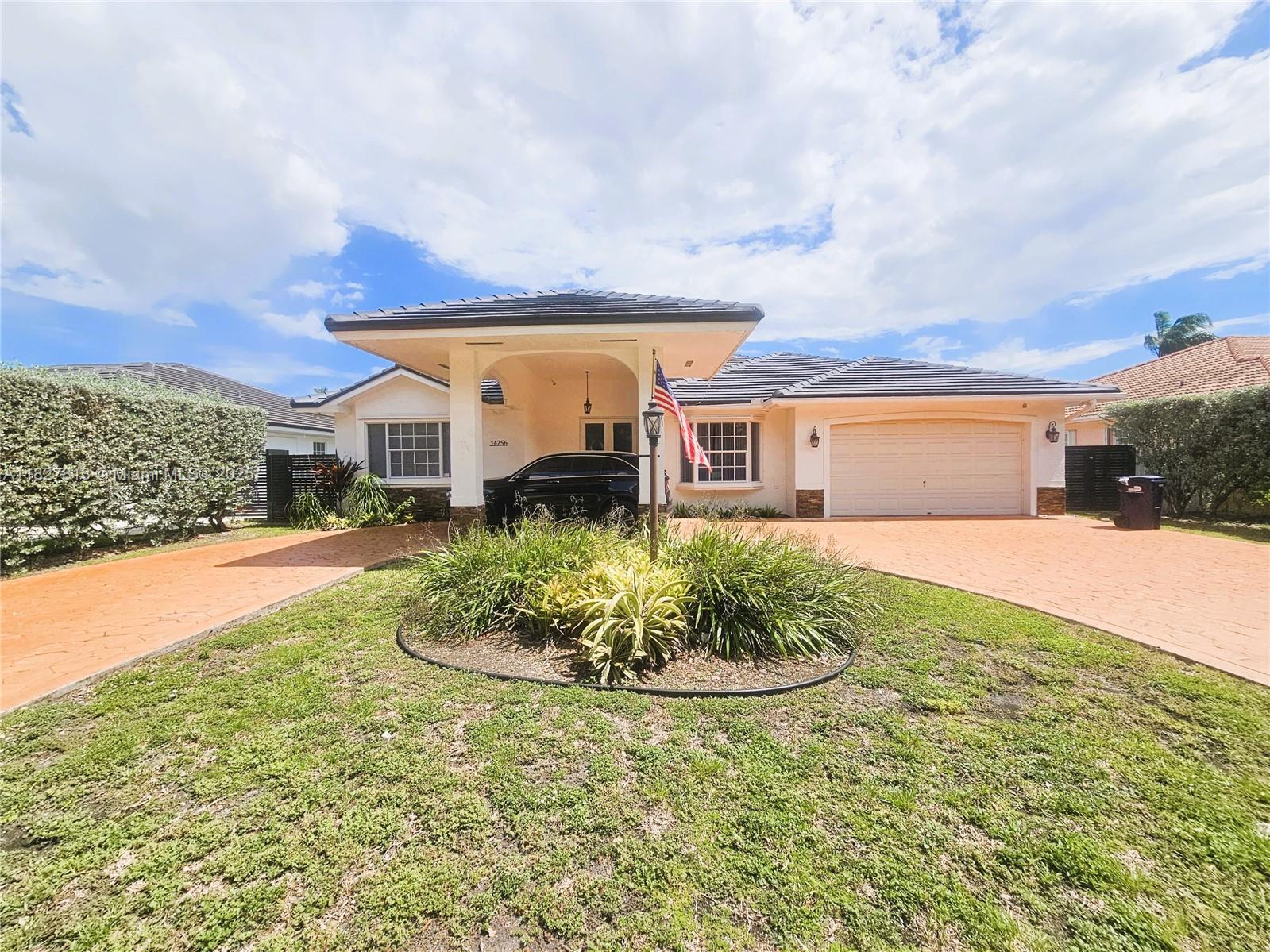 Beautifully maintained 4-bedroom, 3-bath home in highly desirable West Kendall neighborhood. Features include an open floor plan, fresh interior paint, updated kitchen, and a brand-new roof. Enjoy outdoor living with a private pool, jacuzzi, spacious yard, patio, and circular driveway with porta cachet. Excellent curb appeal! Located near top-rated schools: Joe Hall Elementary, W.R. Thomas Middle, and G. Holmes Braddock Senior High. Pool and yard maintenance included in rent. Move-in ready and perfect for comfortable living and entertaining.