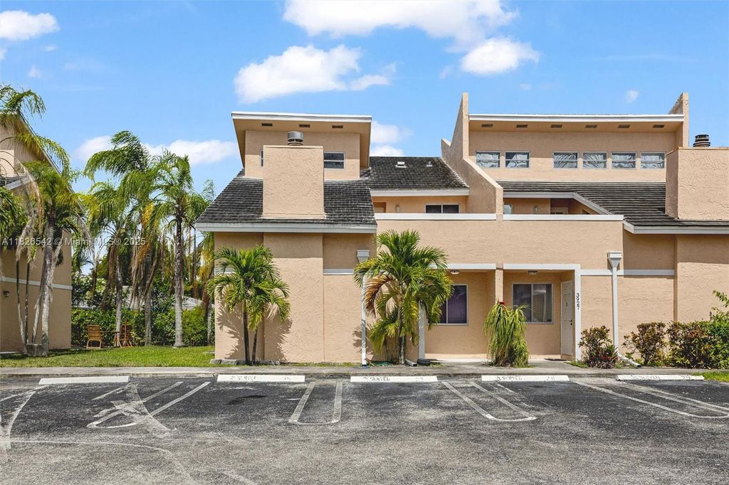 Photo of 3931 Coral Springs Dr #26, Coral Springs, FL 33065 (MLS # A11826542)