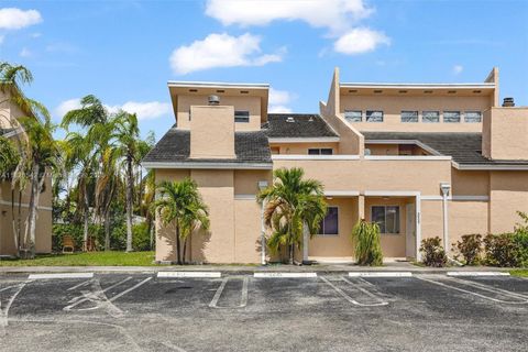 Photo of 3931 Coral Springs Dr #26, Coral Springs, FL 33065 (MLS # A11826542)