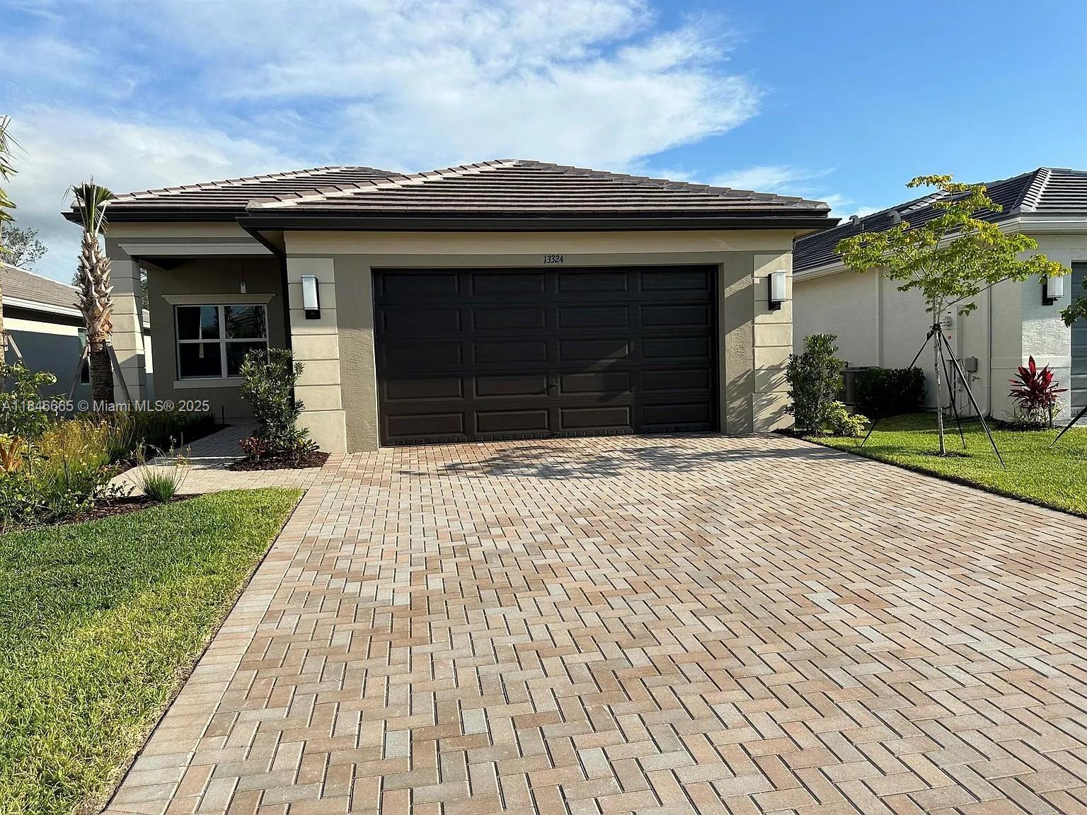 Discover resort-style living in this exquisite 3-bedroom, 2.5-bathroom Tribeca model home, located in the vibrant Valencia Grove at Riverland, an exclusive 55+ community in Port St. Lucie, FL. Perfectly positioned right on the scenic Paseo and bike path, this home offers unmatched access to the social lifestyle that defines this premier community. Amenities: 34,000 sq. ft. Social Club: Resort-style pool, card rooms, billiards, and event spaces. 16-acre Sports & Racquet Club: 51,000 sq. ft. of wellness facilities, including tennis, pickleball, bocce, and an indoor pool. On-site café/bar, plus a vibrant calendar of clubs, classes, and events like aqua fitness, yoga, Zumba, and group trips. Near Port St. Lucie’s beaches, PGA Village golf, and NY Mets Spring Training.