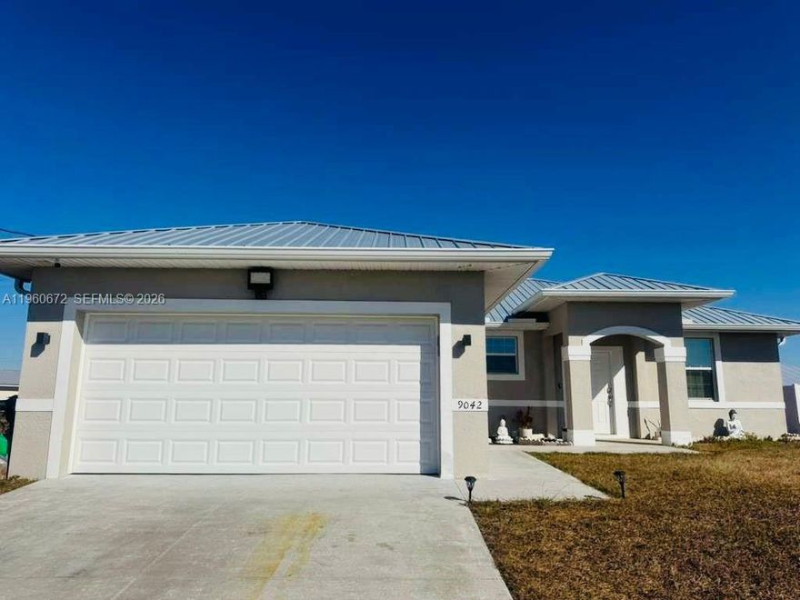 Welcome Home! Priced to Sell quick. This well-maintained home in Port LaBelle features a durable metal roof and a whole-home purified and alkaline water system. The property includes ceiling fans in every room, with two bedrooms enhanced by stylish barn-style closet doors. Exterior upgrades include added front and rear lighting to highlight the home’s curb appeal. A Samsung washer and dryer are included, along with an existing ADT security system for added peace of mind. Built in 2022.