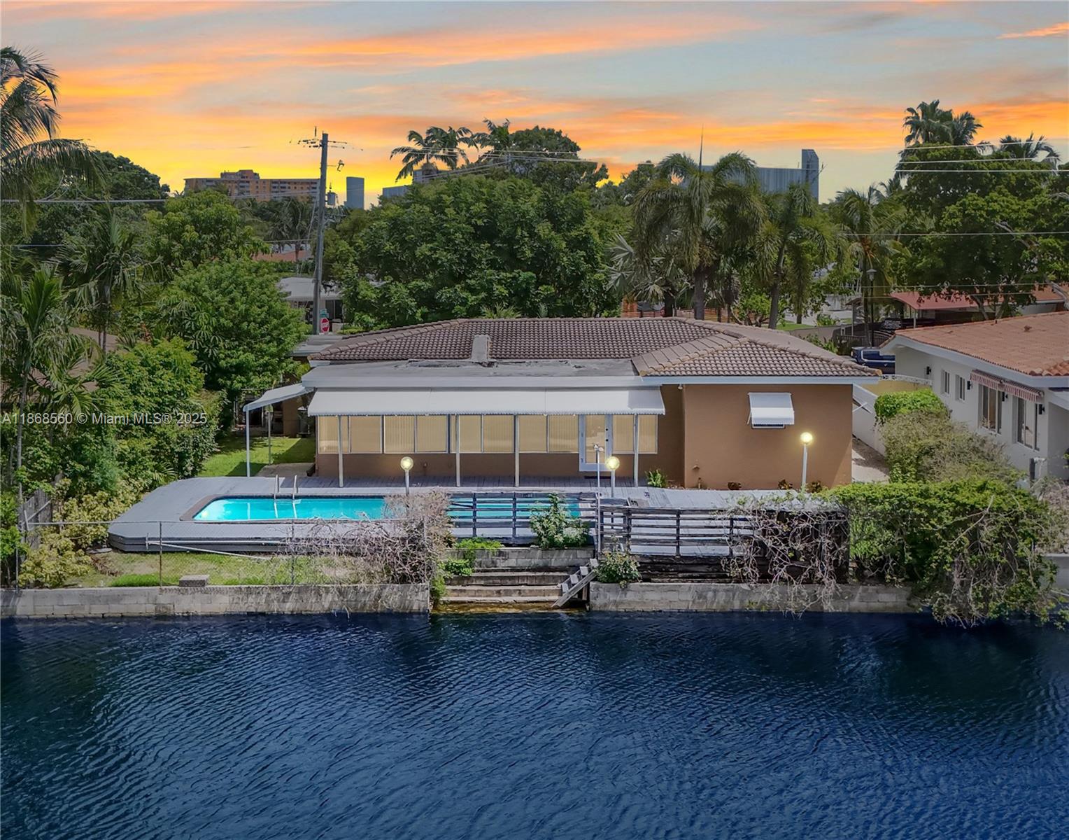 Prime Waterfront Development Opportunity in Keystone Point! Located in prestigious 24HR guard-gated Keystone Point Islands, this 75’ x 125’ lot offers 75 ft of deep-water frontage with direct ocean access and one fixed bridge with 10ft clearance. Situated on wide 100+ ft canal, property offers expansive water views & endless redevelopment potential. Lovingly maintained by same owner for many years this single-sty pool home spans over 2,300 SF with 3 beds, 2 baths, & 2-car gar. 2001 tile roof—ideal for full renovation or teardown. 9,373 SF of land in one of North Miami’s most desirable waterfront neighborhoods, rare opportunity to build a luxury custom home in a prime location just mins from Bal Harbour, beaches, and top-tier marinas. Longtime ownership—first time on market in 50+ years!